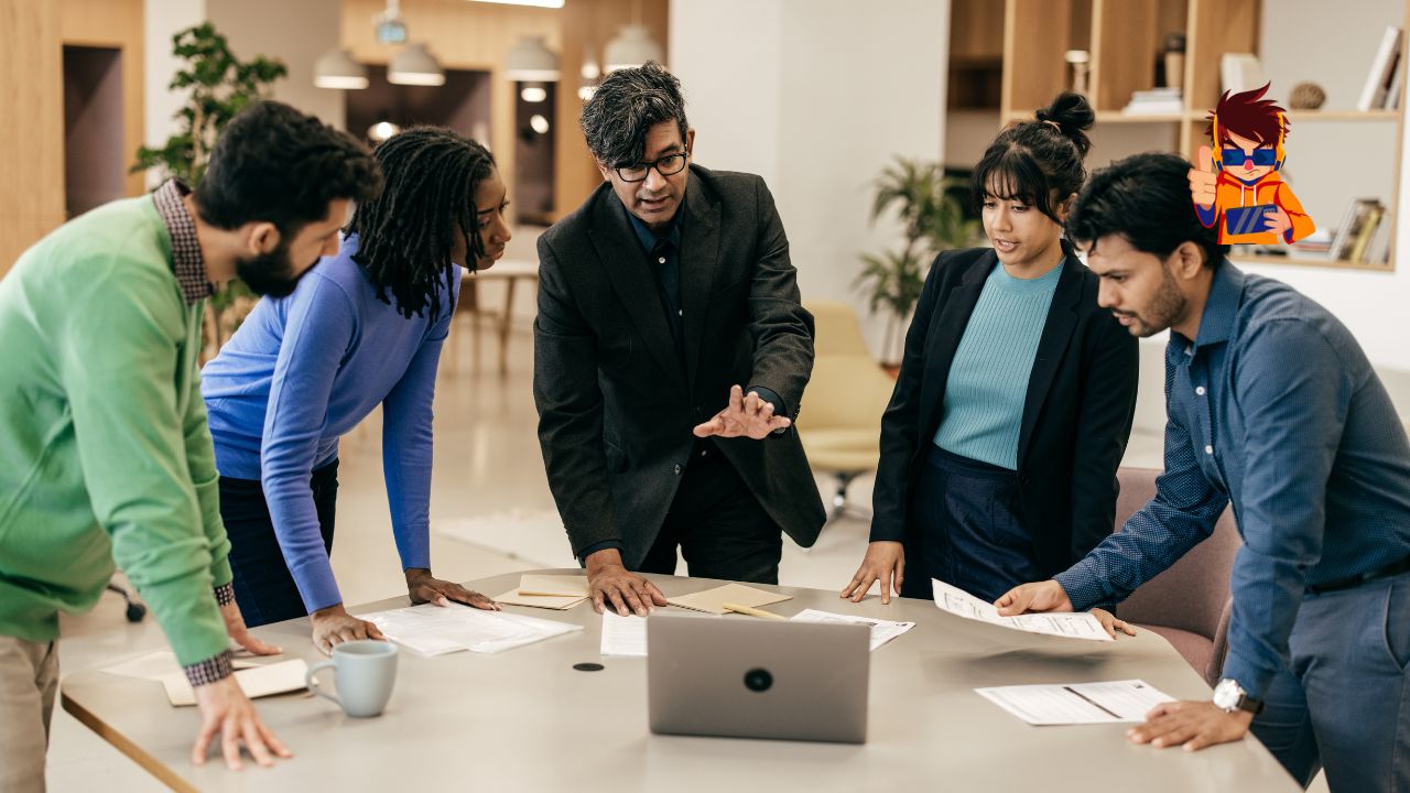 Building Resilience Life Lessons from Successful Entrepreneurs A diverse group of professionals collaborating around a table in a modern office. The central figure, an older man in a suit, is gesturing while explaining a concept, with others attentively listening and engaging. The scene represents teamwork and resilience in a professional environment, drawing inspiration from successful entrepreneurs