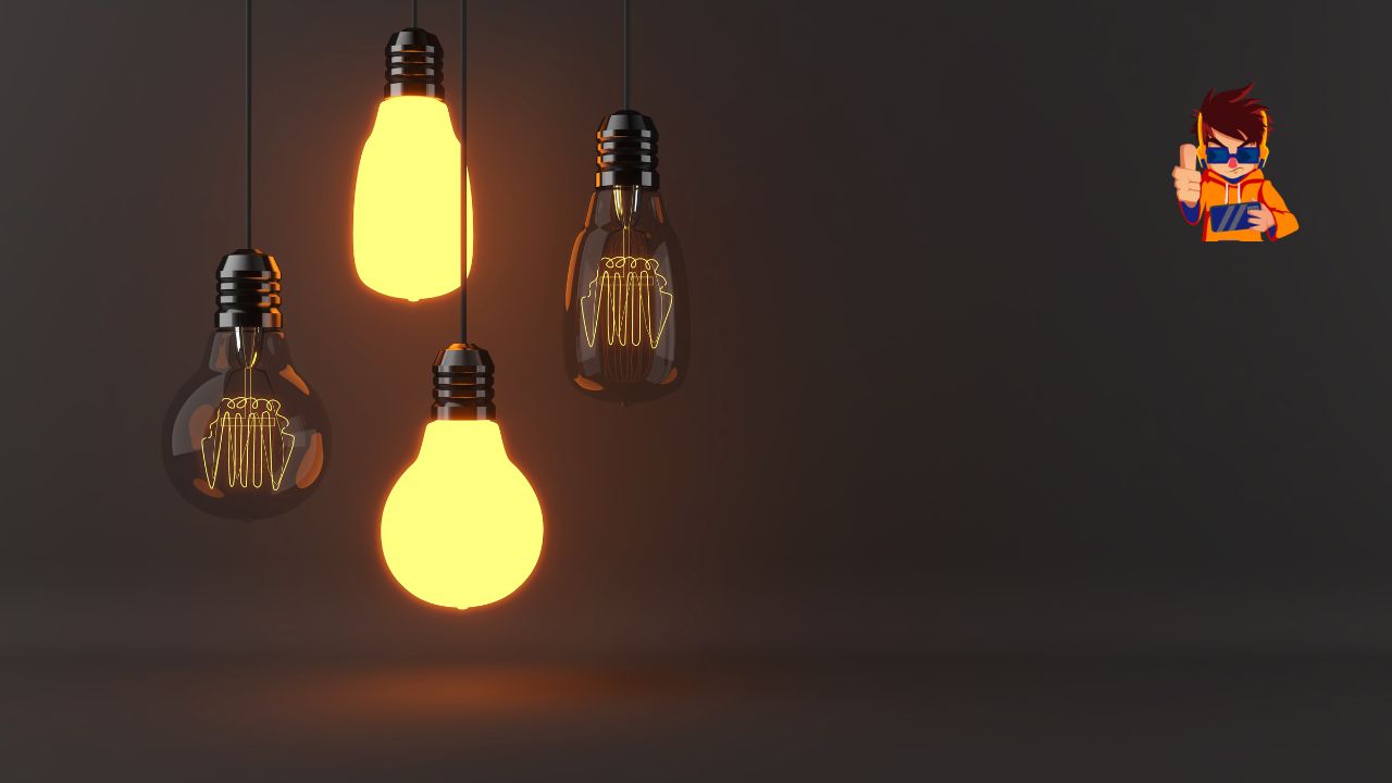 Unusual Brand Collaborations That Actually Worked Four hanging light bulbs, two of which are illuminated, casting a warm glow against a dark background. The image symbolizes creativity, innovation, and bright ideas, reflecting the concept of unusual yet successful brand collaborations.