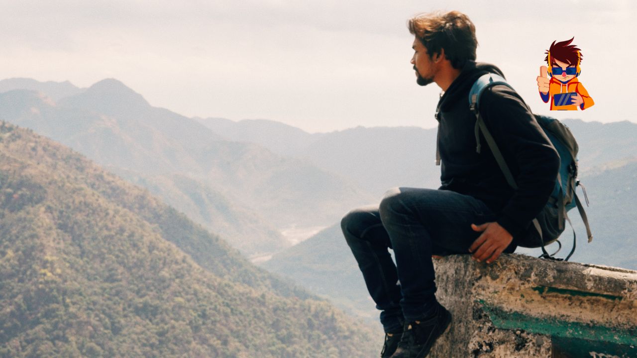 Why Traveling Solo Could Be the Best Decision You Ever Make A man with a backpack sitting on a ledge overlooking a scenic mountain range, gazing into the distance. The image conveys the spirit of adventure and introspection often associated with solo travel.