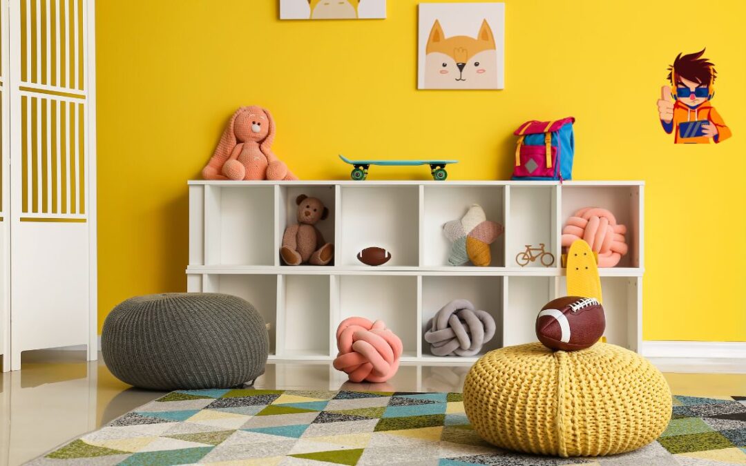 A colorful and neatly organized children's playroom with toys, plush cushions, and cubby storage against a bright yellow wall.