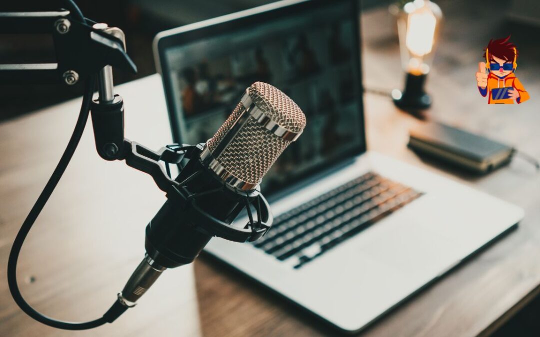 Close-up of a podcast microphone in front of an open laptop on a wooden desk, with a warm ambient light in the background.